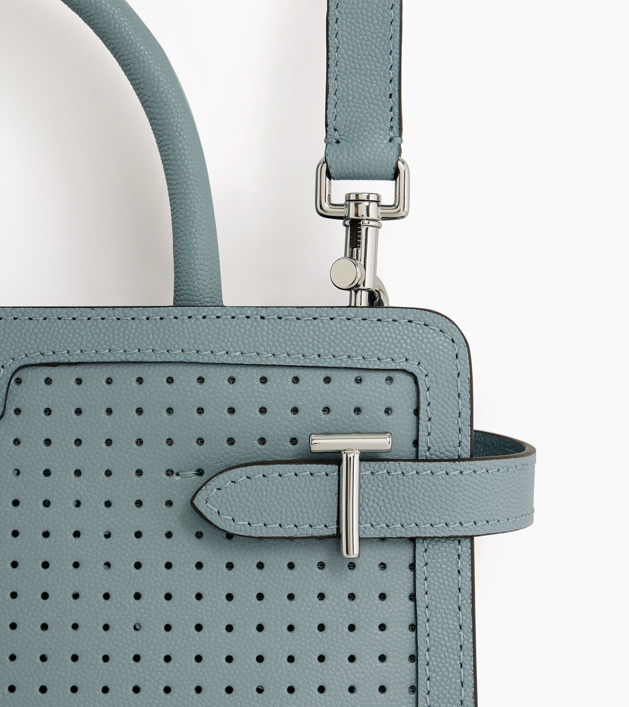 Mittelgroße Handtasche Modell Emilie aus perforiertem Caviar-Leder